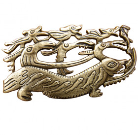 Brooch "Deity on a lizard"