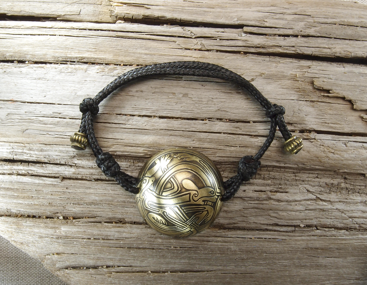 Spherical bracelet-lace "Celtic intertwined dogs"